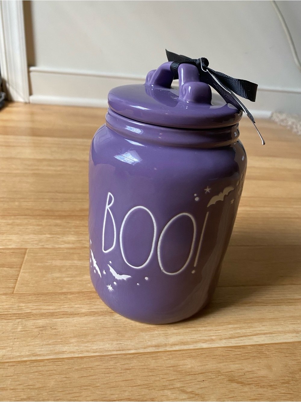 2024 Rae Dunn BOO baby ceramic Halloween canister featuring white bat and stars